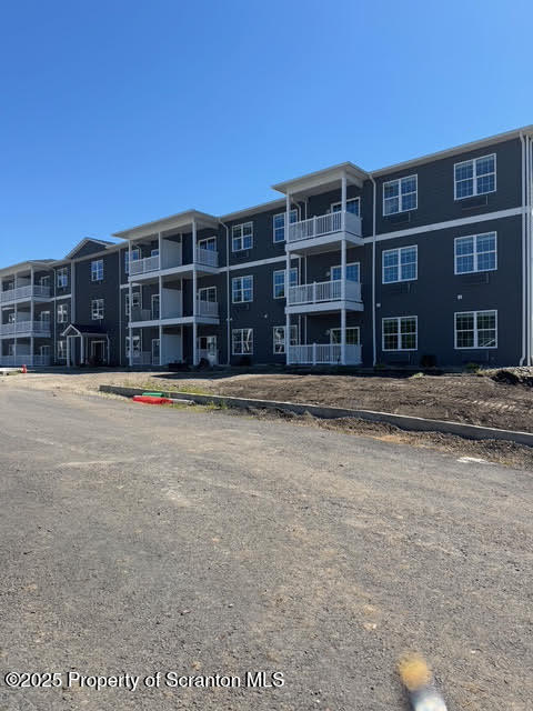 417 Circle Drive Taylor, PA 18517 - Photo 2 of 33 a front view of residential houses with yard
