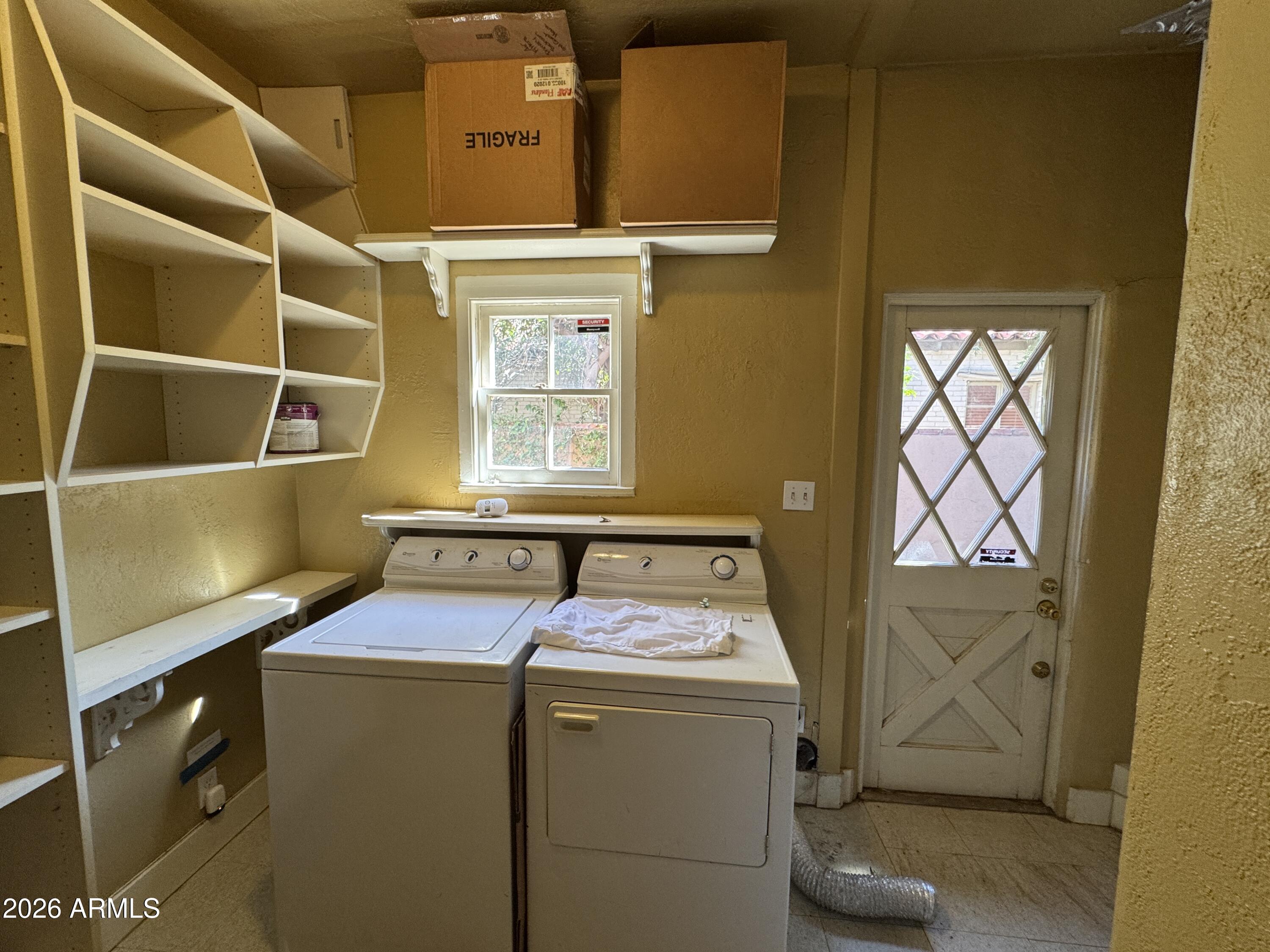 505 West Granada Road Phoenix, AZ 85003 - Photo 13 of 30 a utility room with dryer and washer