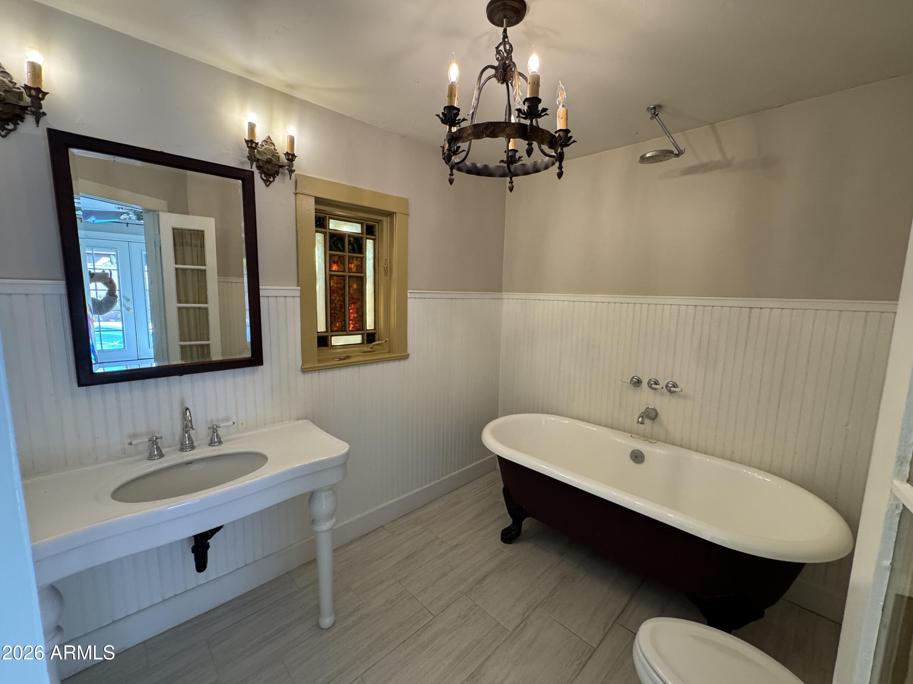 505 West Granada Road Phoenix, AZ 85003 - Photo 20 of 30 a spacious bathroom with a double vanity sink and a mirror