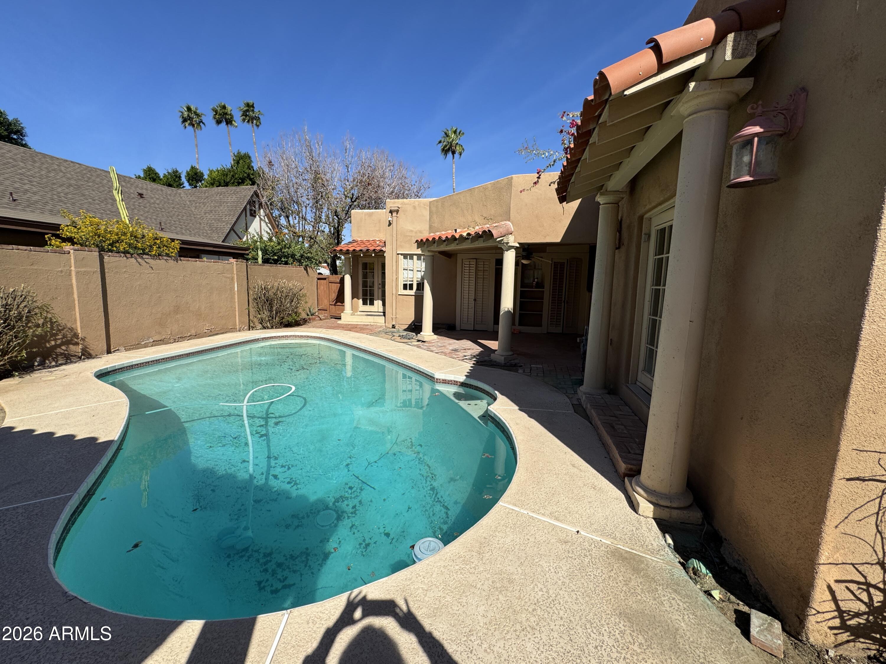 505 West Granada Road Phoenix, AZ 85003 - Photo 23 of 30 a view of a swimming pool with a backyard