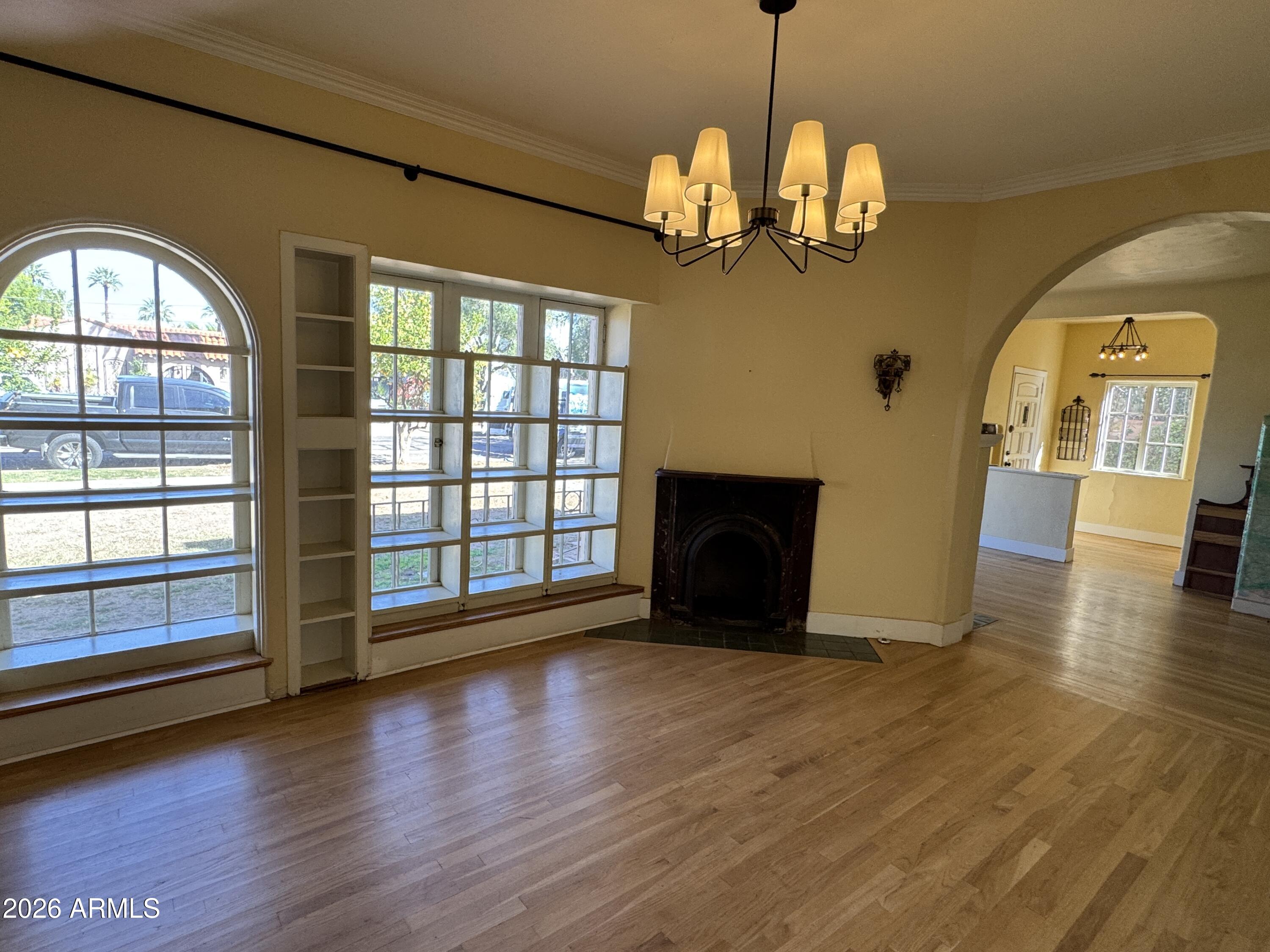 505 West Granada Road Phoenix, AZ 85003 - Photo 4 of 30 a view of a livingroom with wooden floor and a large window