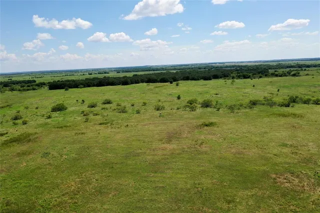 a view of a field with sitting space