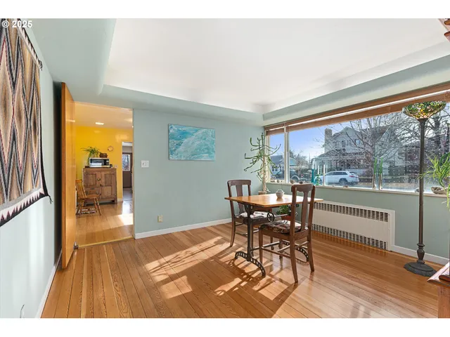 a kitchen with stainless steel appliances a stove top oven and a refrigerator