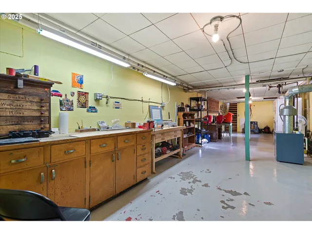 a hallway with a dining table and chairs