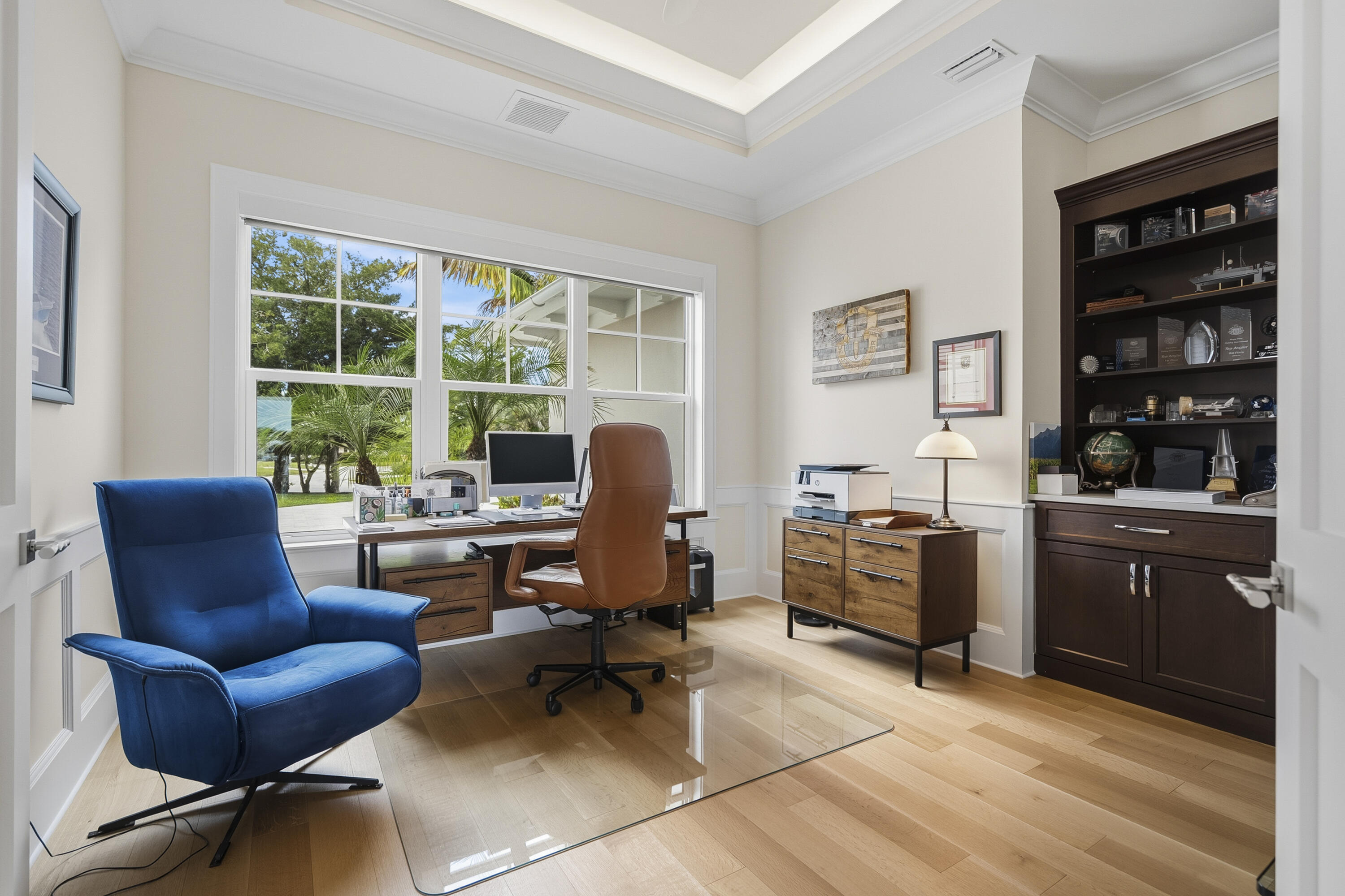 3973 Southeast Topsail Court Stuart, FL 34997 - Photo 24 of 38 a view of a workspace with furniture and a window