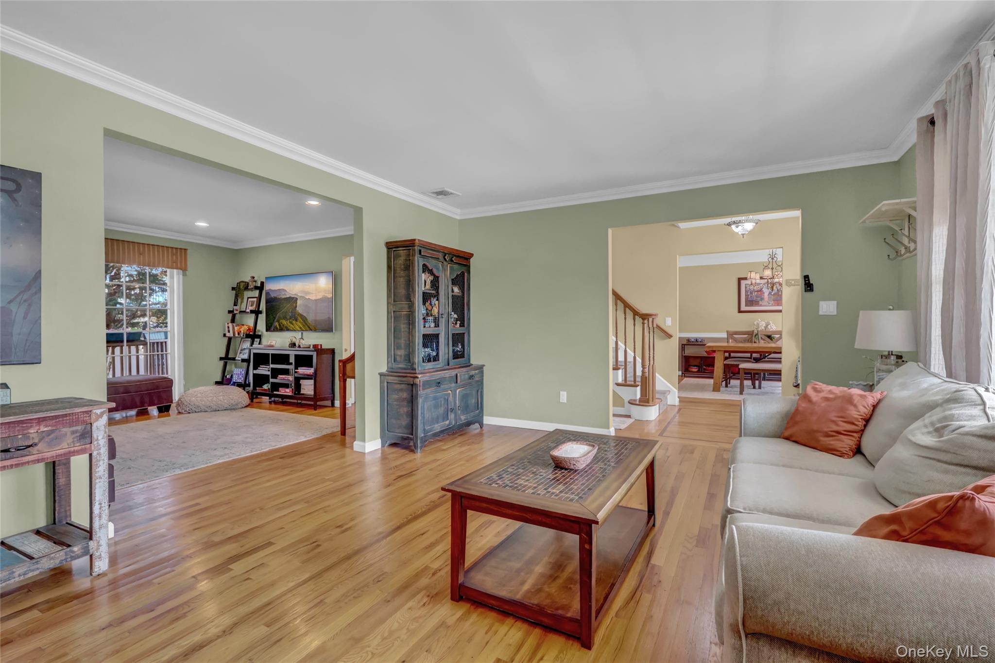 18 Hampton Road Lynbrook, NY 11563 - Photo 14 of 37 a living room with furniture and wooden floor