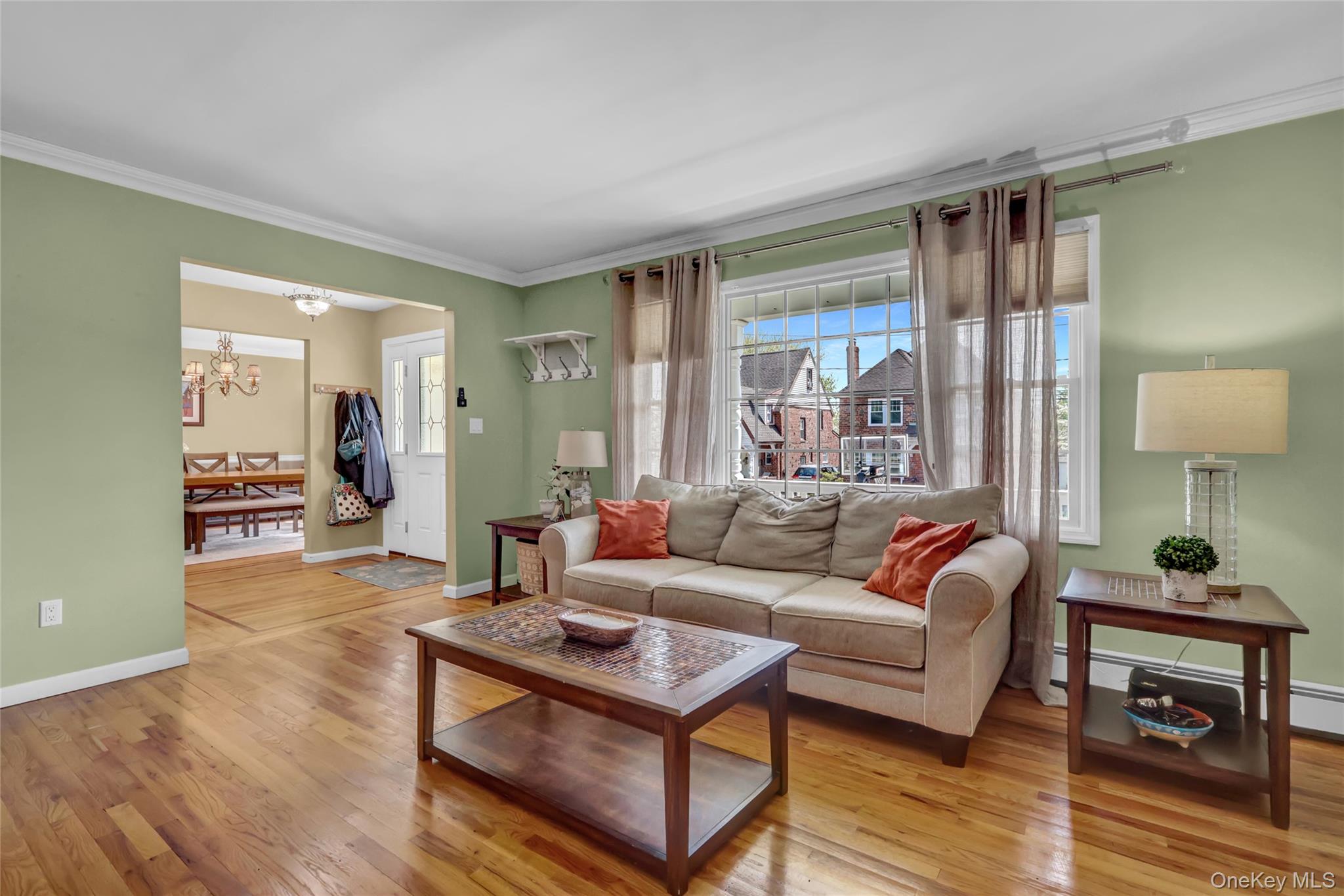 18 Hampton Road Lynbrook, NY 11563 - Photo 15 of 37 a living room with furniture and a wooden floor