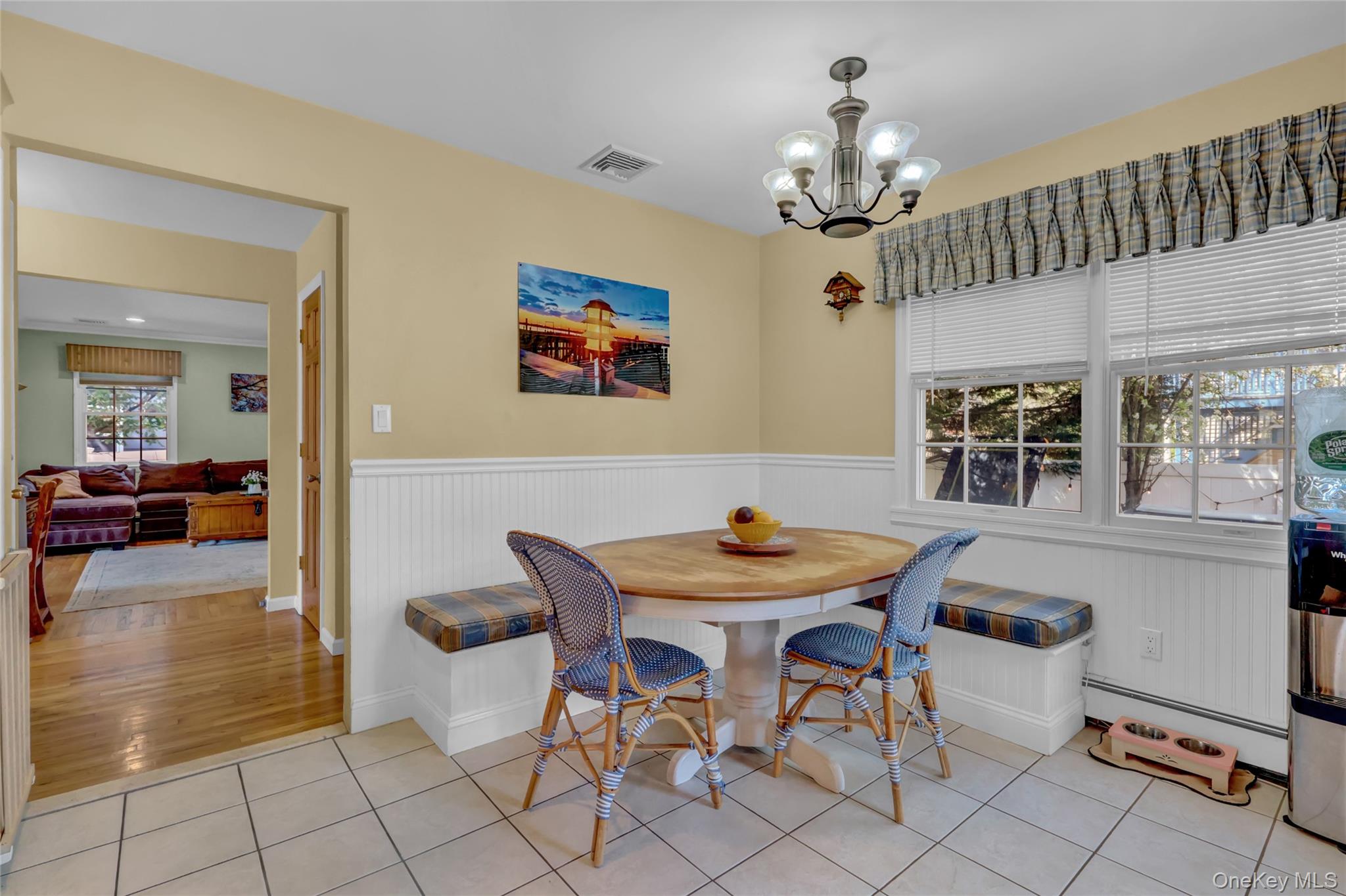 18 Hampton Road Lynbrook, NY 11563 - Photo 20 of 37 a view of a dining room with furniture and chandelier