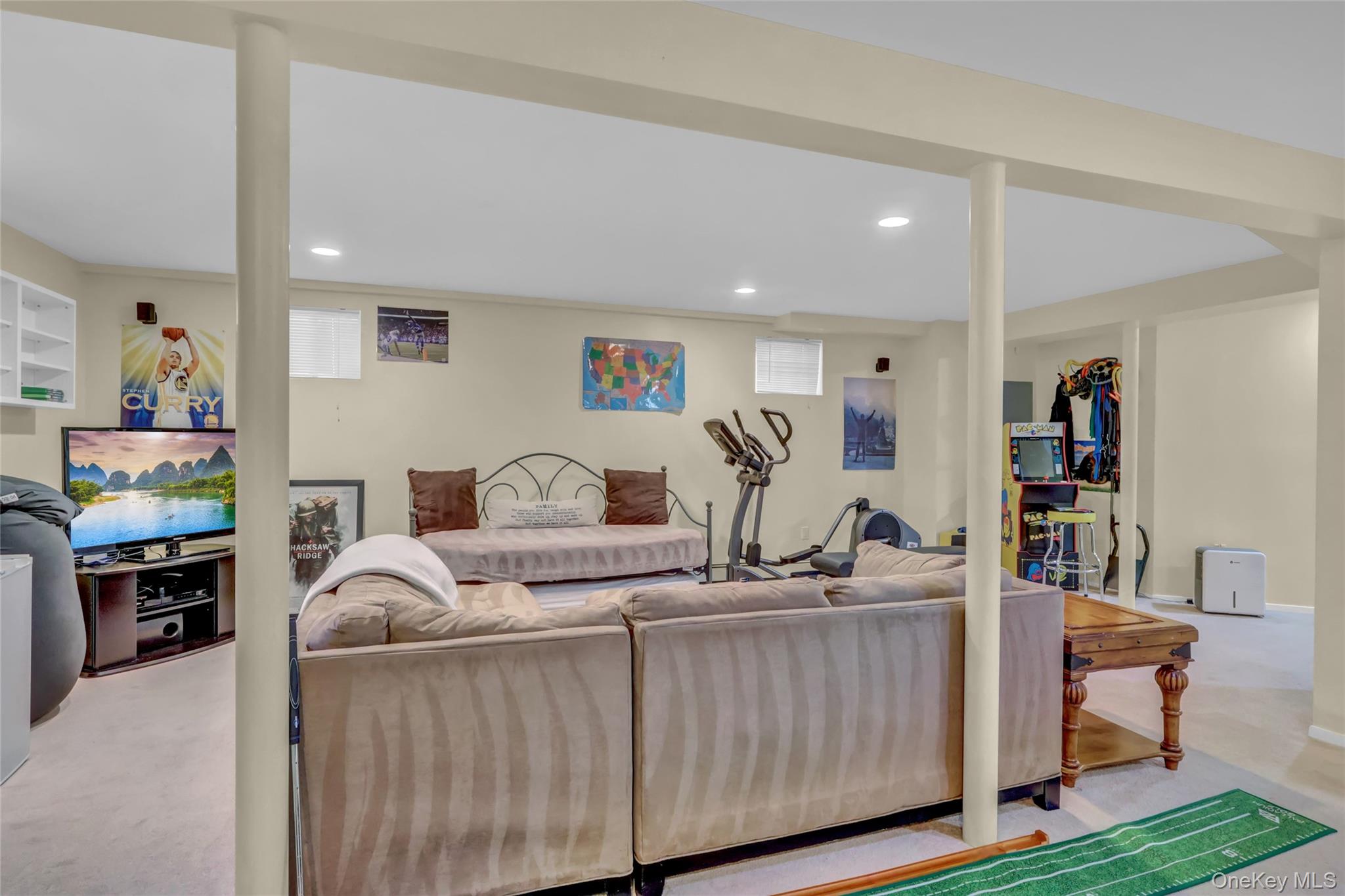 18 Hampton Road Lynbrook, NY 11563 - Photo 23 of 37 a living room with furniture and a wooden floor