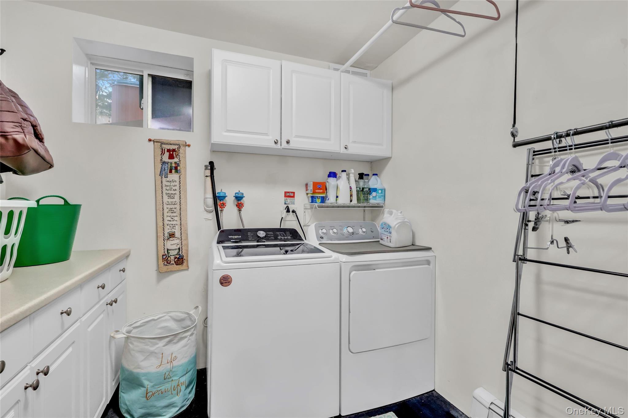 18 Hampton Road Lynbrook, NY 11563 - Photo 25 of 37 a kitchen with a stove and a refrigerator