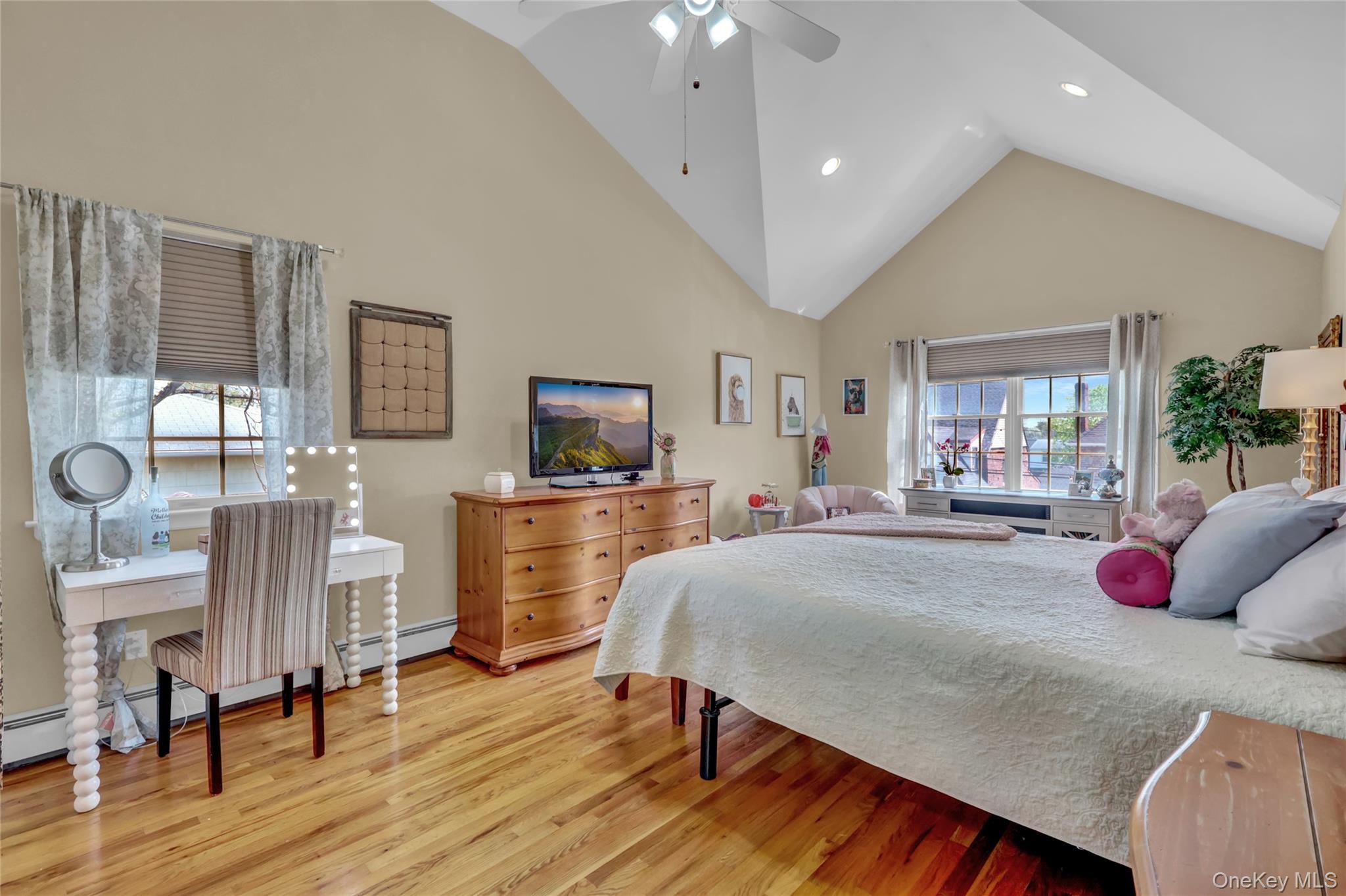 18 Hampton Road Lynbrook, NY 11563 - Photo 27 of 37 a bed room with furniture and wooden floor