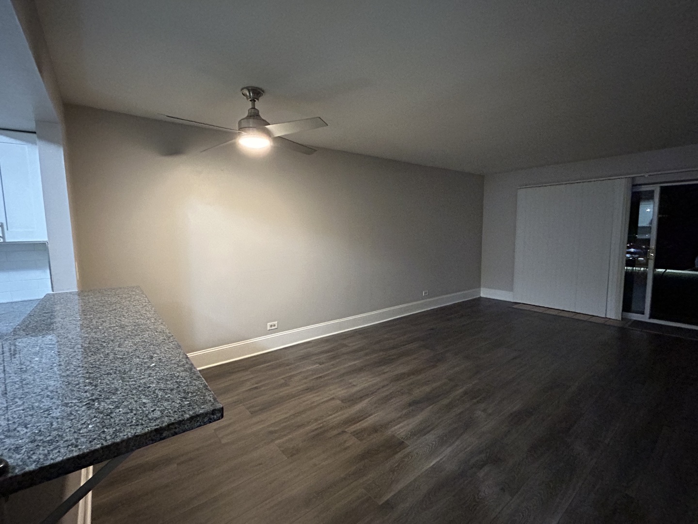 235 North Mill Road, Unit 114B Addison, IL 60101 - Photo 11 of 28 a view of empty room with wooden floor