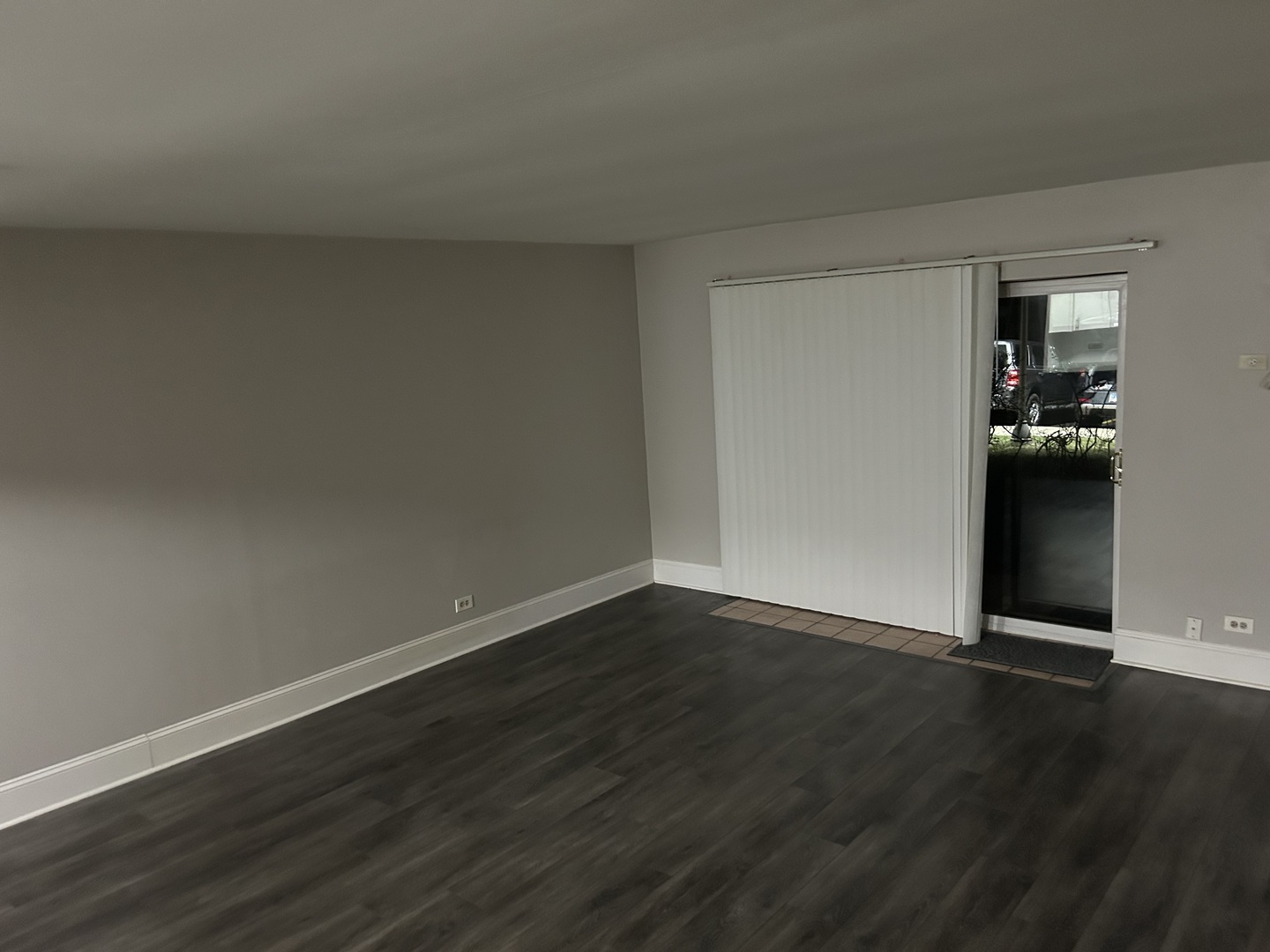 235 North Mill Road, Unit 114B Addison, IL 60101 - Photo 12 of 28 a view of an empty room and wooden floor