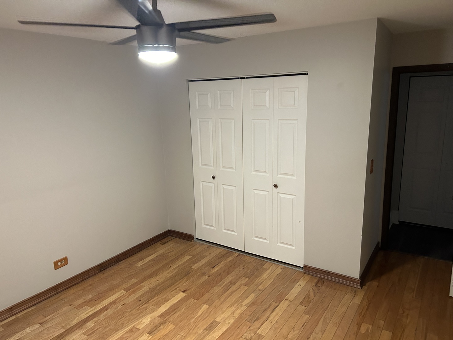235 North Mill Road, Unit 114B Addison, IL 60101 - Photo 19 of 28 a view of a room with wooden floor