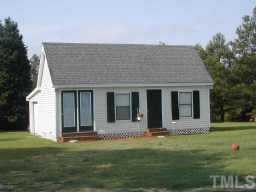 1035 Clayton Road Benson, NC 27504 - Photo 6 of 7 a view of a house with a yard