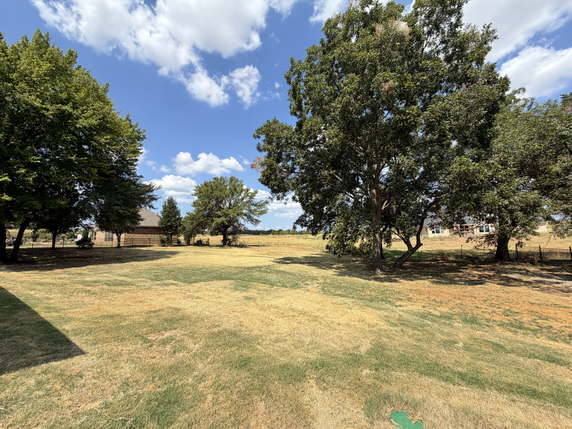 33 Wilderness Road North Calera, OK 74730 - Photo 34 of 39 Expansive grassy lot with mature trees