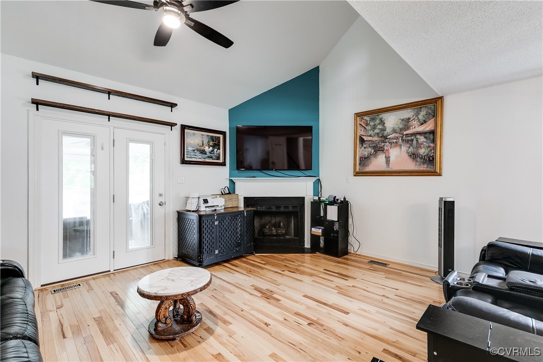 3003 Chartwood Drive Sandston, VA 23150 - Photo 12 of 29 a living room with furniture and a flat screen tv