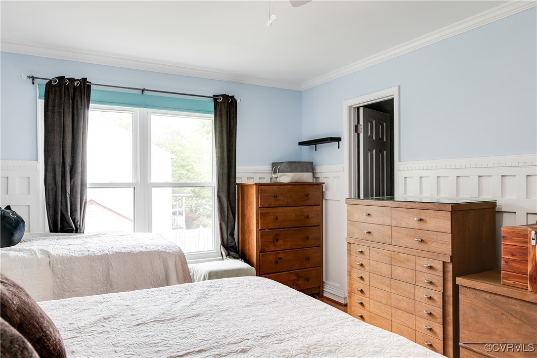3003 Chartwood Drive Sandston, VA 23150 - Photo 19 of 29 a bedroom with a bed and a dresser