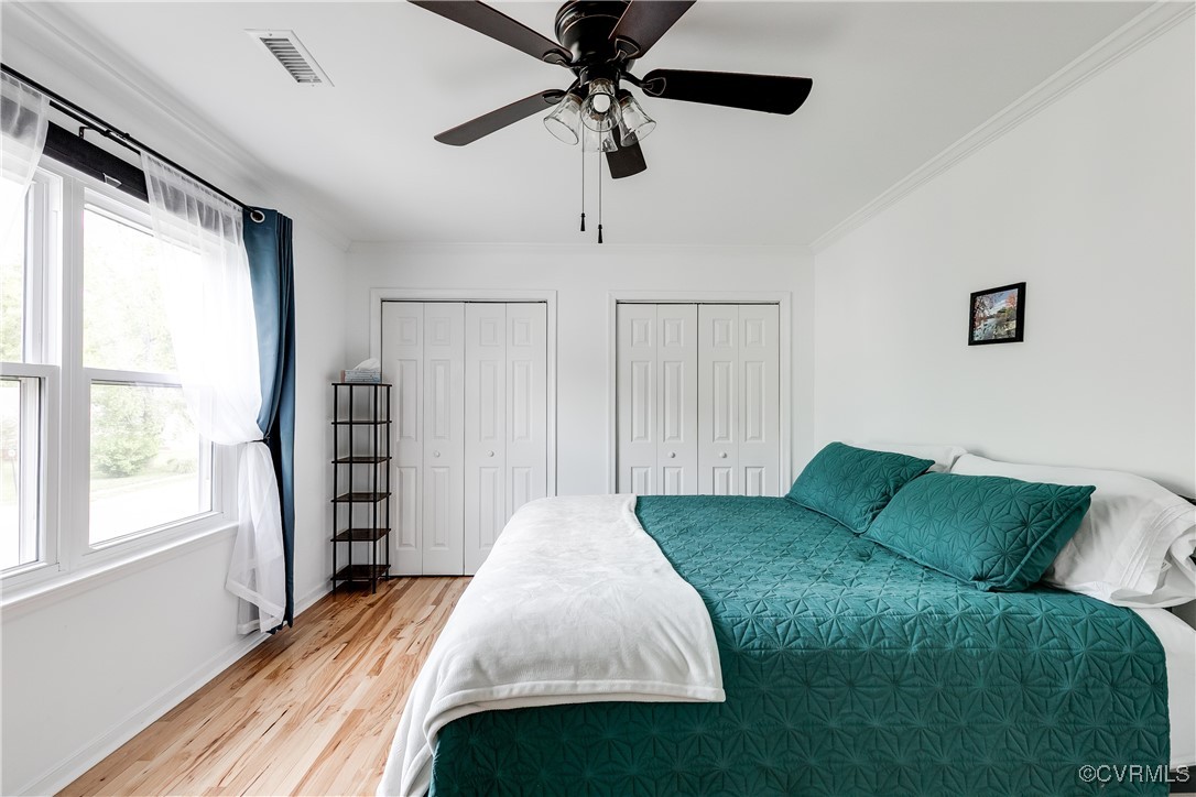 3003 Chartwood Drive Sandston, VA 23150 - Photo 20 of 29 a bed sitting in a bedroom next to a window