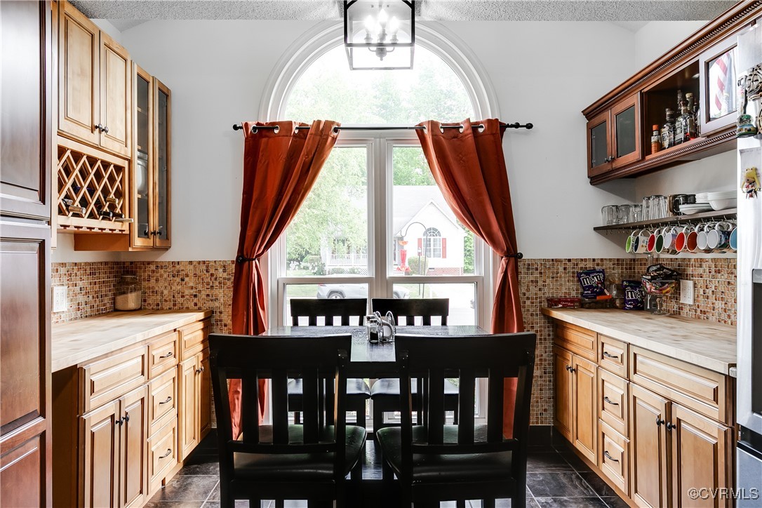 3003 Chartwood Drive Sandston, VA 23150 - Photo 5 of 29 a view of a kitchen with stainless steel appliances granite countertop a stove top oven