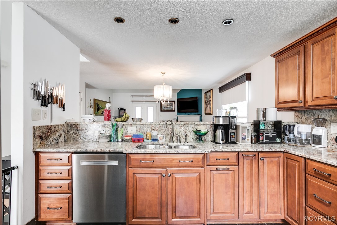 3003 Chartwood Drive Sandston, VA 23150 - Photo 6 of 29 a kitchen with stainless steel appliances kitchen island granite countertop a sink and cabinets
