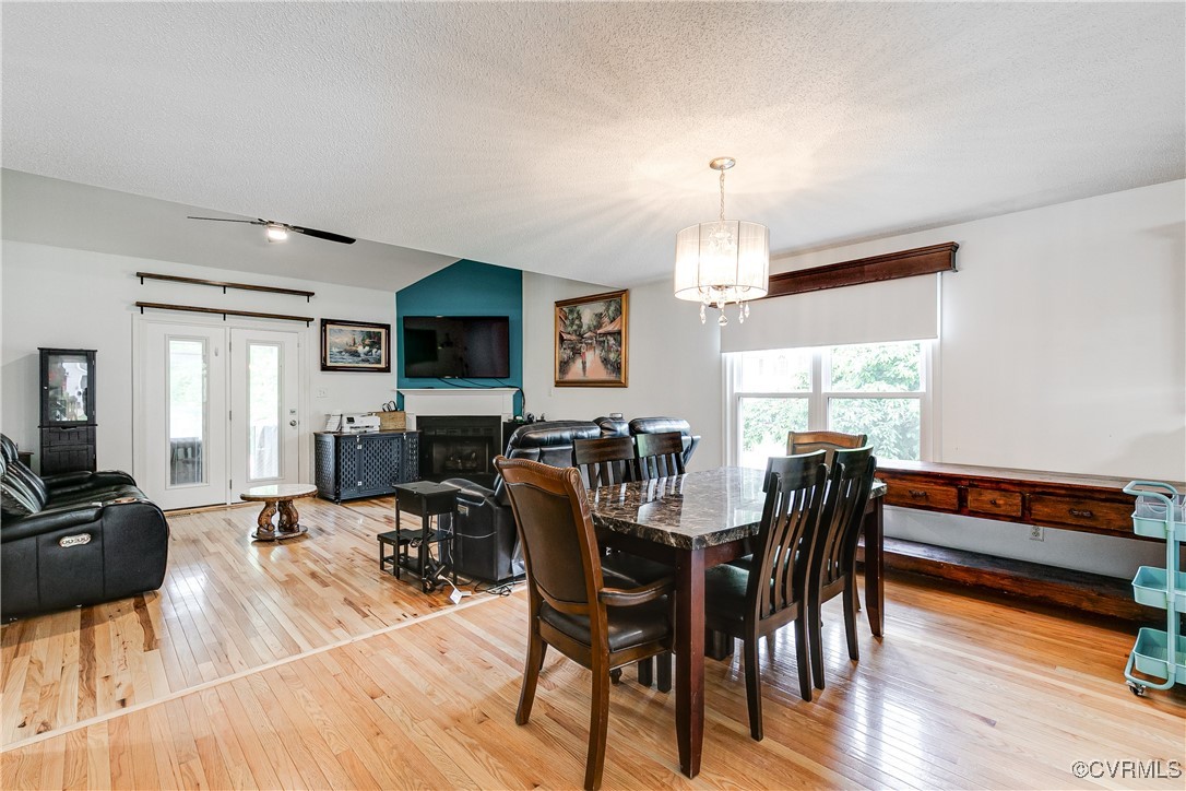 3003 Chartwood Drive Sandston, VA 23150 - Photo 8 of 29 a view of a dining room with furniture window and wooden floor
