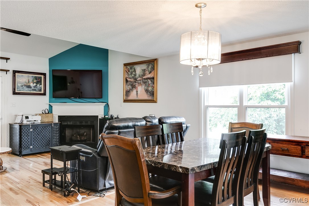 3003 Chartwood Drive Sandston, VA 23150 - Photo 9 of 29 a view of a dining room with furniture window and wooden floor