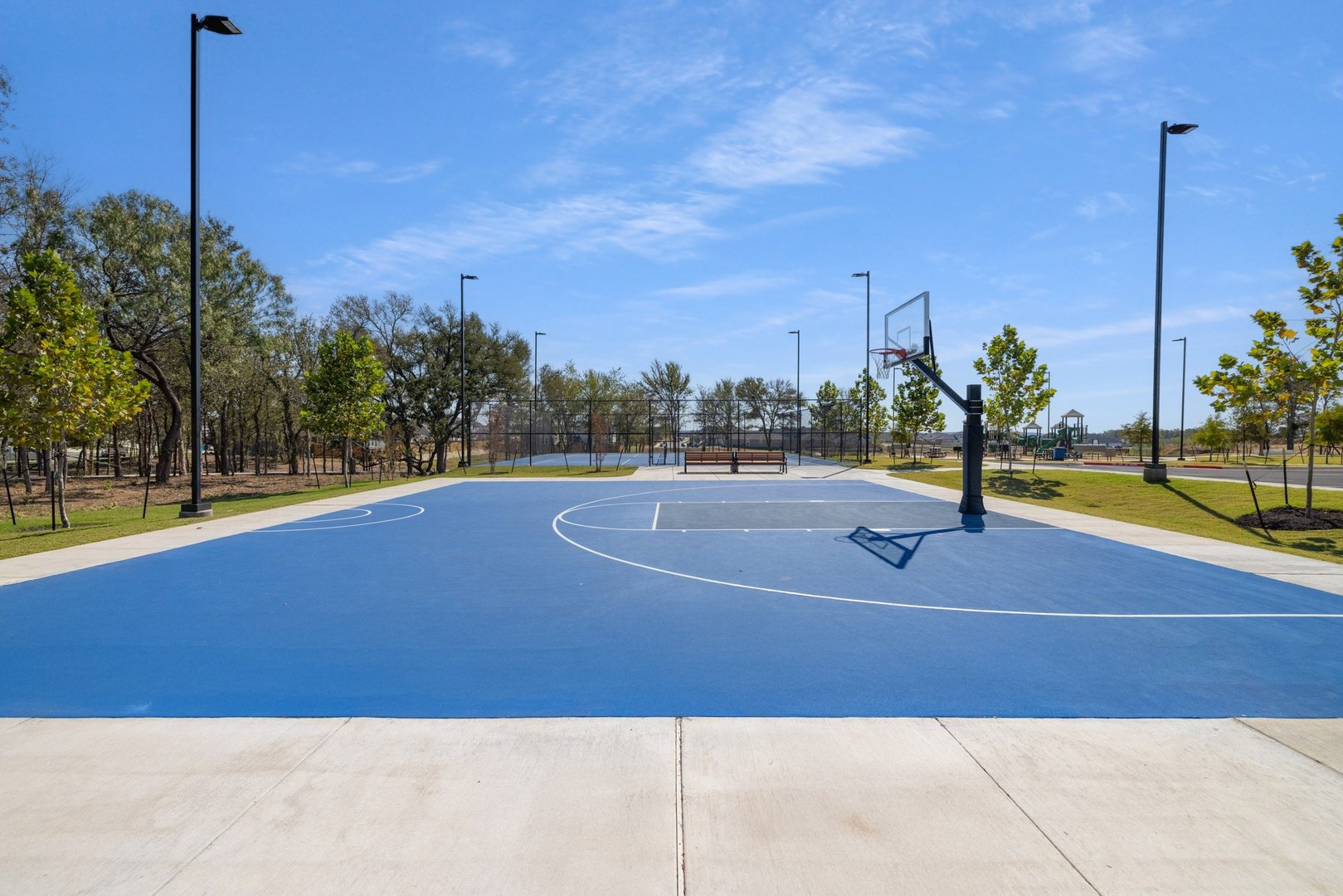 194 Hornet Street Elgin, TX 78621 - Photo 31 of 40 a view of a tennis court