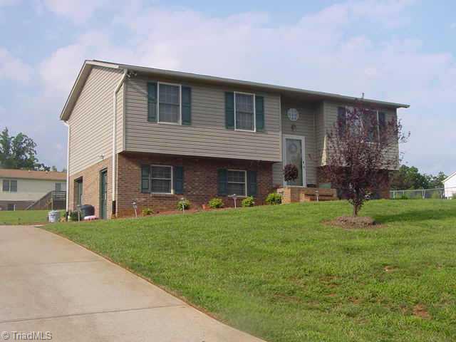 Exterior Front. Very pretty curb appeal, the house on a hill, yet not too steep