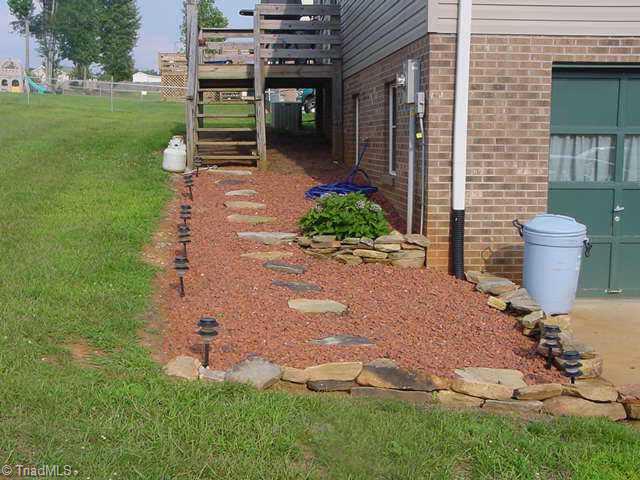 1200 Capella Ridge Road King, NC 27021 - Photo 3 of 8 Other. Brick chips,solar lighting,neat yard