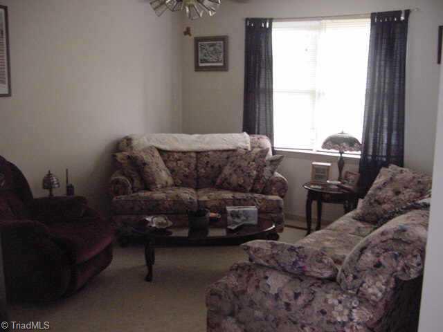1200 Capella Ridge Road King, NC 27021 - Photo 5 of 8 Other. Living room,bright and cheery overlooks foyer