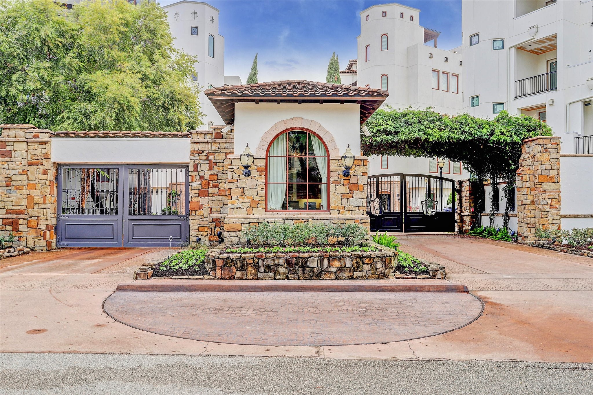 5213 Feagan Street, Unit A Houston, TX 77007 - Photo 2 of 47 Living in Caceres means being part of an exclusive community where security, privacy, and luxury are paramount. The neighborhood's gated entrance and 24-hour security offer peace of mind, while the well-maintained streets and common areas enhance the overall sense of pride in ownership.