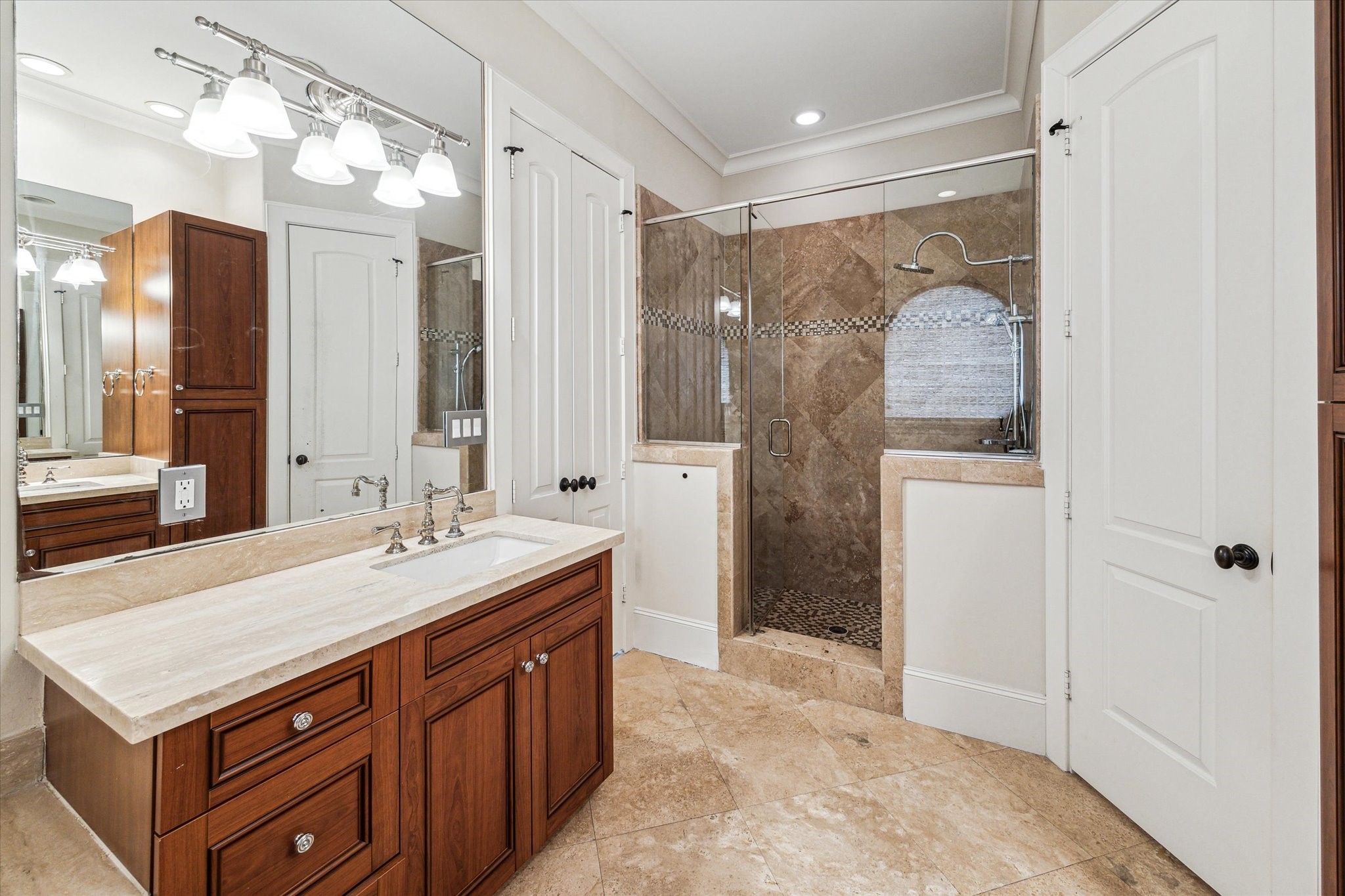 5213 Feagan Street, Unit A Houston, TX 77007 - Photo 25 of 47 The master suite is a sanctuary of luxury, boasting a spa-like ensuite bathroom with a soaking tub, walk-in shower, and double sinks.