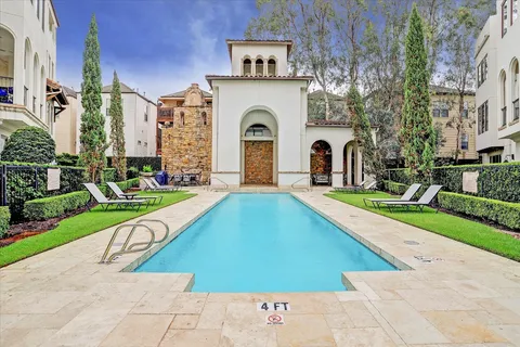 a front view of a house with swimming pool