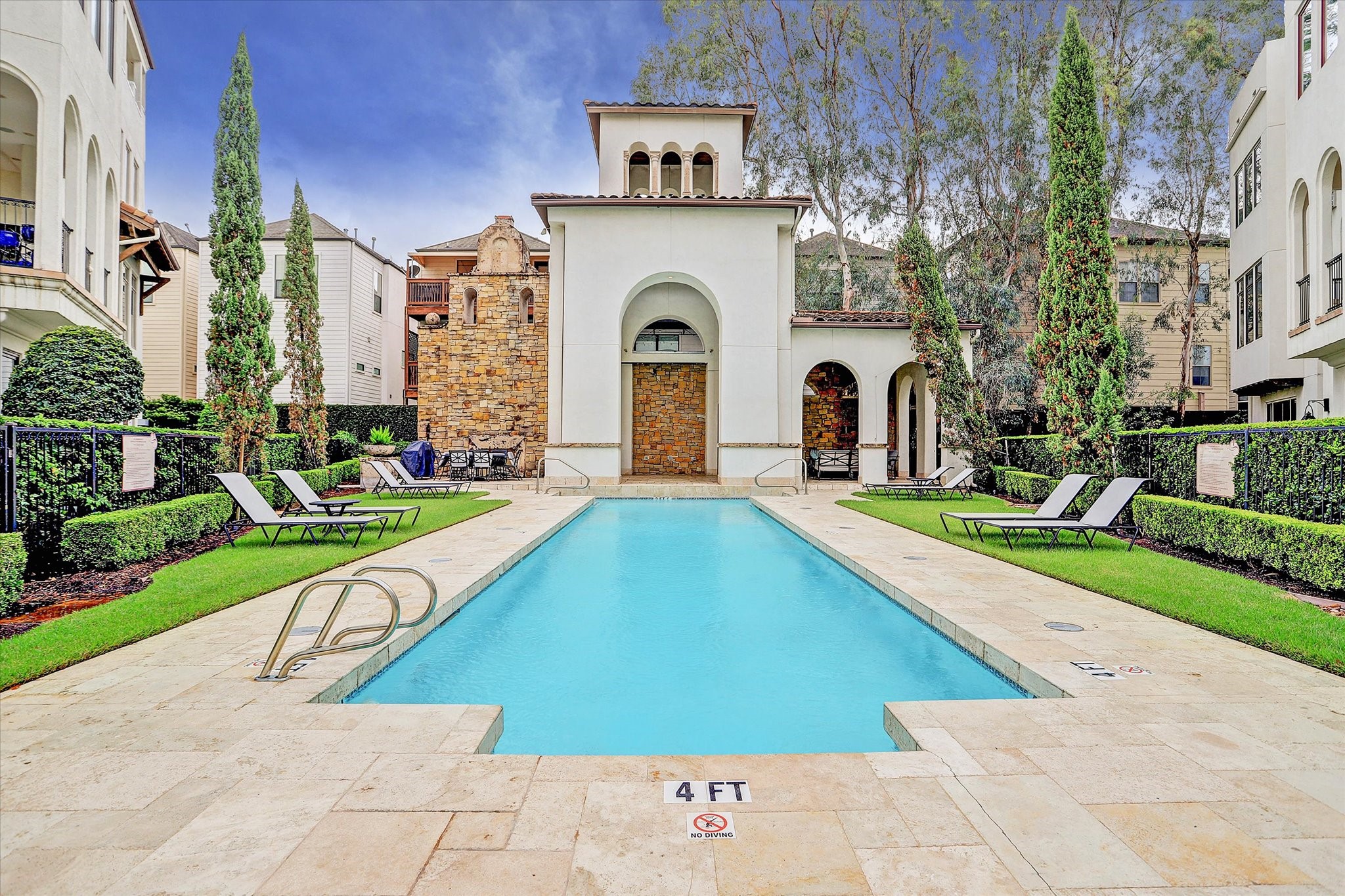 5213 Feagan Street, Unit A Houston, TX 77007 - Photo 36 of 47 The spectacular community pool is a focal point of the neighborhood, surrounded by lush landscaping that creates a tranquil setting for relaxation and recreation.