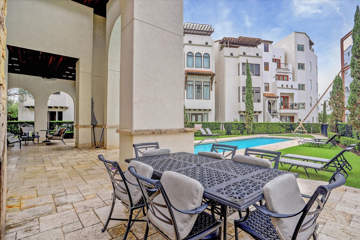 5213 Feagan Street, Unit A Houston, TX 77007 - Photo 38 of 47 a patio with table and chairs