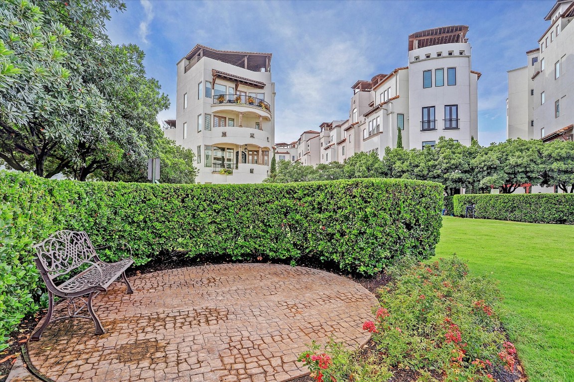 5213 Feagan Street, Unit A Houston, TX 77007 - Photo 41 of 47 a view of a garden with a building