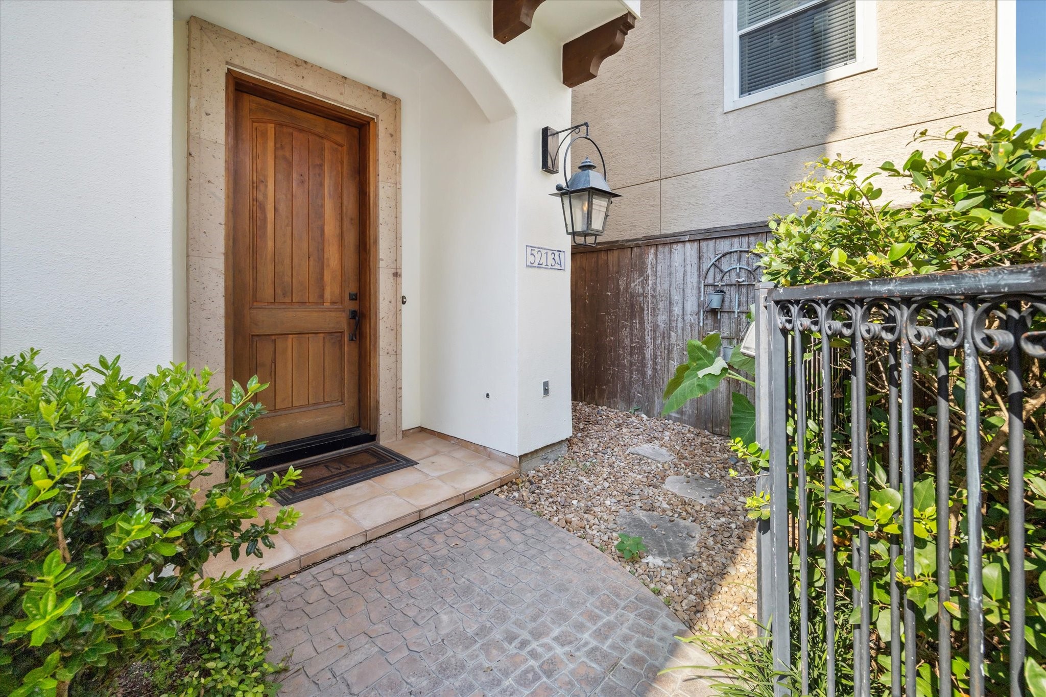 5213 Feagan Street, Unit A Houston, TX 77007 - Photo 7 of 47 Entrance to the house A. The attached garage includes an electric car charger, catering to modern needs.