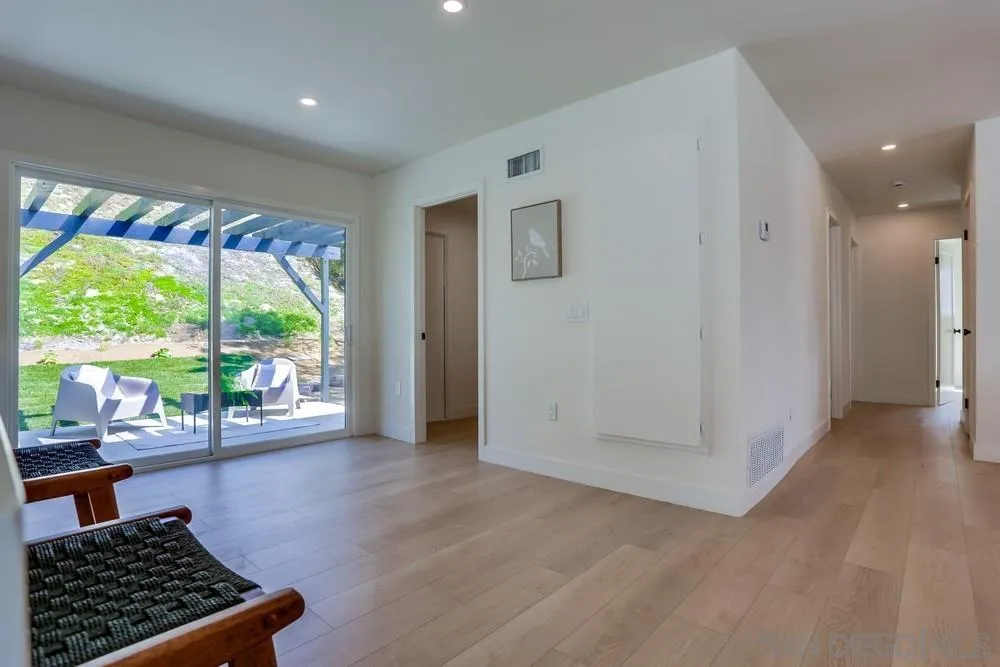 12701 McFeron Road Poway, CA 92064 - Photo 15 of 32 a room with natural light and a large window