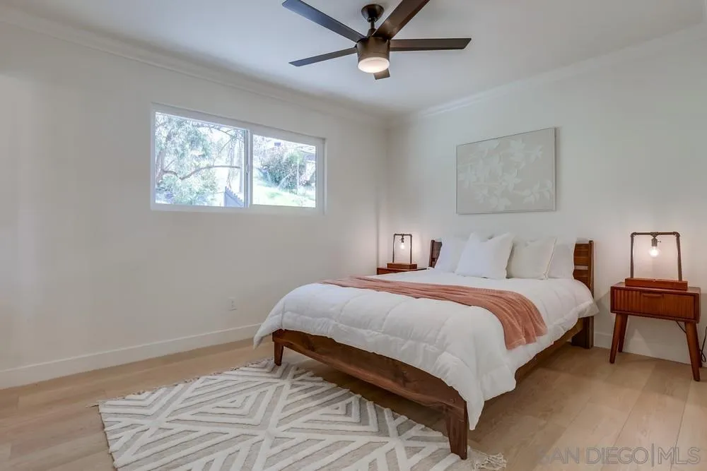 12701 McFeron Road Poway, CA 92064 - Photo 17 of 32 a bedroom with a bed and window