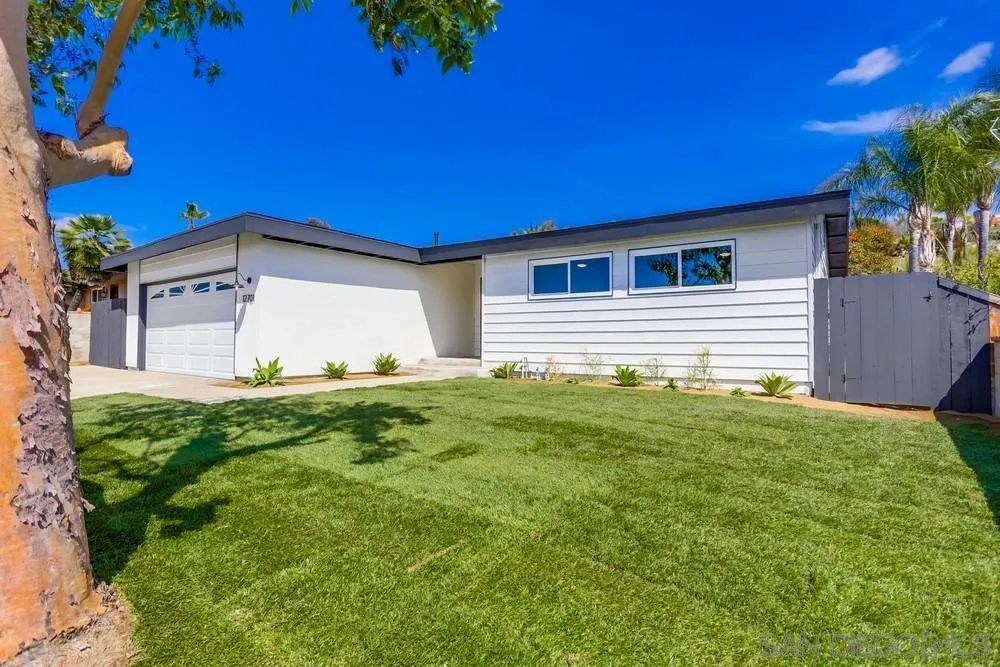 12701 McFeron Road Poway, CA 92064 - Photo 2 of 32 a backyard of a house with large trees