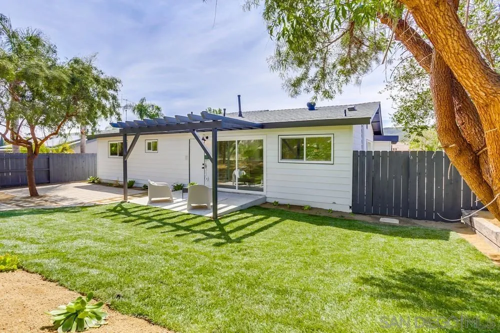 12701 McFeron Road Poway, CA 92064 - Photo 29 of 32 a view of a backyard with a garden and tree
