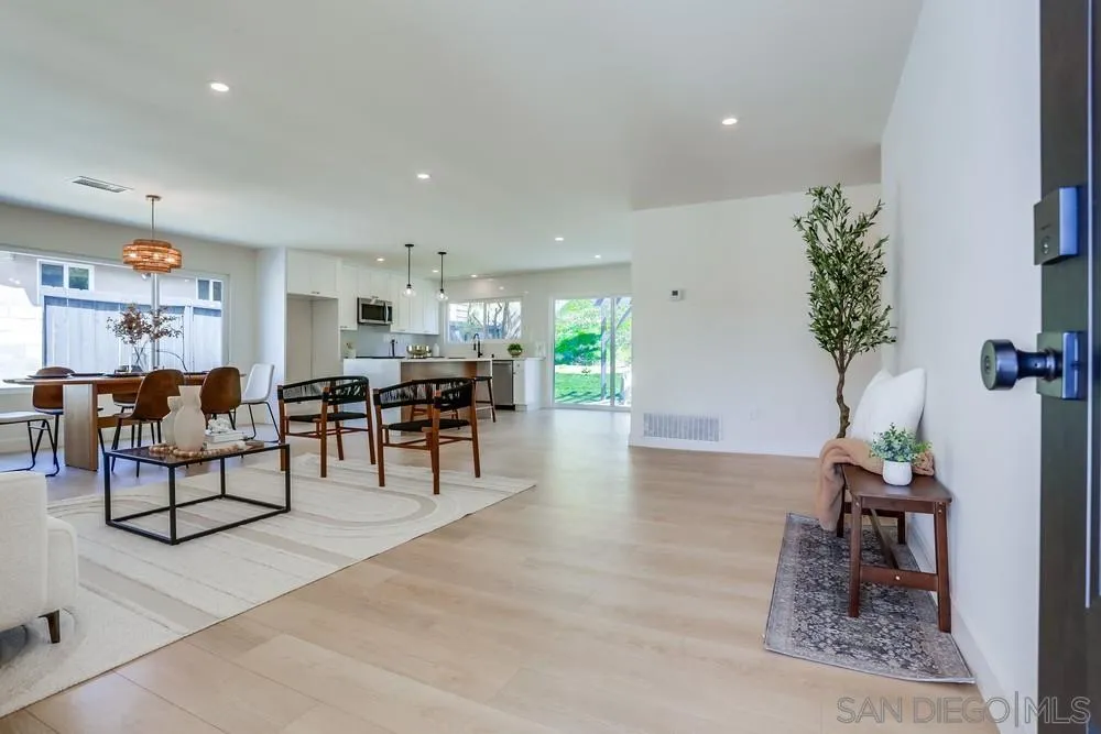 12701 McFeron Road Poway, CA 92064 - Photo 3 of 32 a living room with furniture and wooden floor