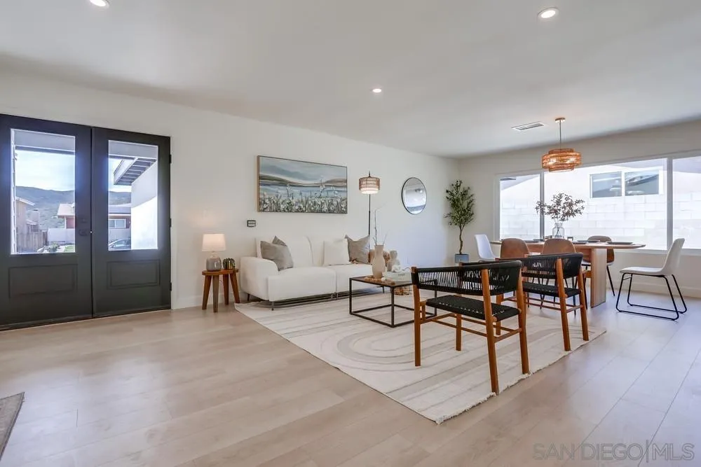 12701 McFeron Road Poway, CA 92064 - Photo 5 of 32 a living room with furniture and a large window