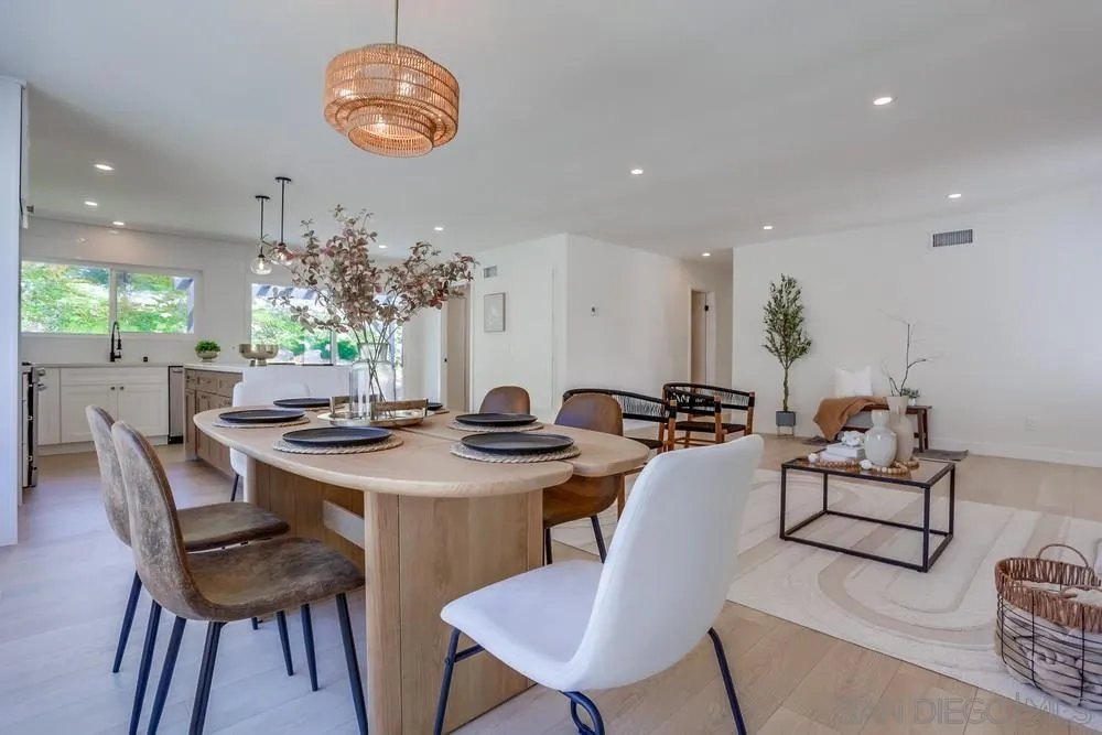12701 McFeron Road Poway, CA 92064 - Photo 9 of 32 a view of a dining room with furniture and chandelier