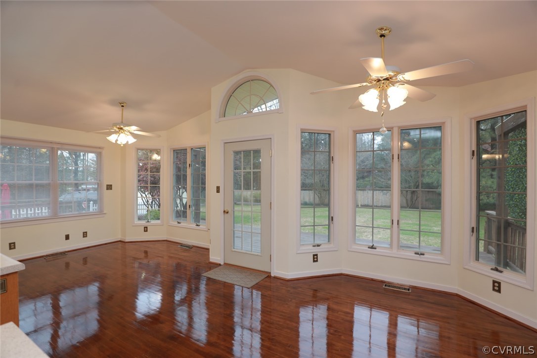 2106 Mt Blanco Road Chester, VA 23836 - Photo 14 of 50 a view of a room with lots of windows and chandelier