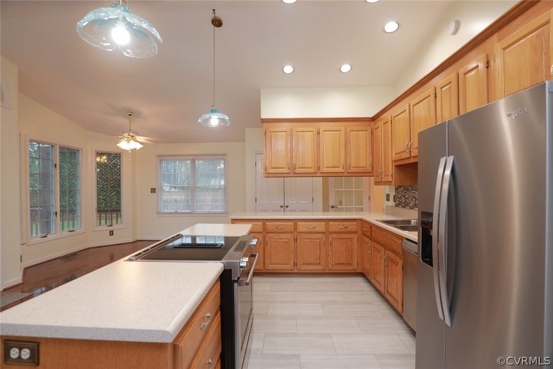 2106 Mt Blanco Road Chester, VA 23836 - Photo 16 of 50 a kitchen with granite countertop a sink stove and refrigerator
