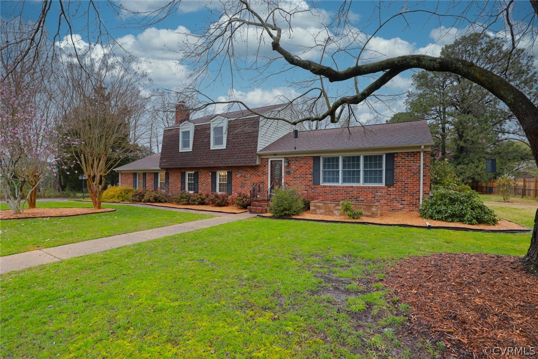 2106 Mt Blanco Road Chester, VA 23836 - Photo 2 of 50 a front view of a house with a yard