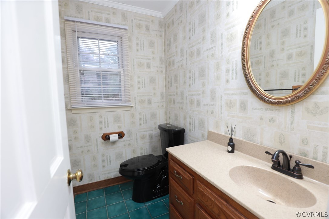 2106 Mt Blanco Road Chester, VA 23836 - Photo 28 of 50 a bathroom with a sink and a mirror