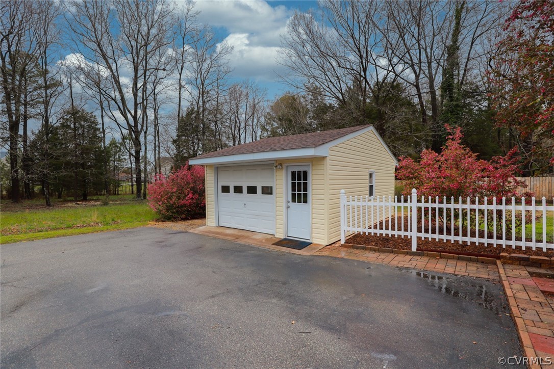 2106 Mt Blanco Road Chester, VA 23836 - Photo 36 of 50 a view of a house with a yard and large trees